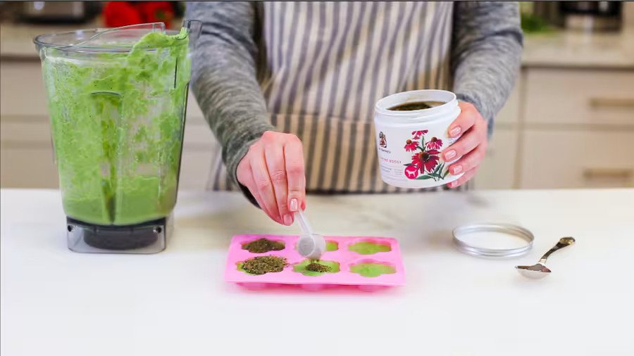 a person making a green St. Patrick's Day homemade dog treats