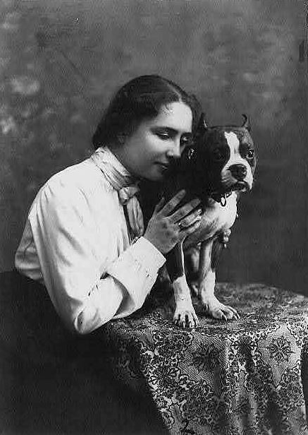 Helen Keller hugging her Boston Terrier Sir Thomas aka Phiz